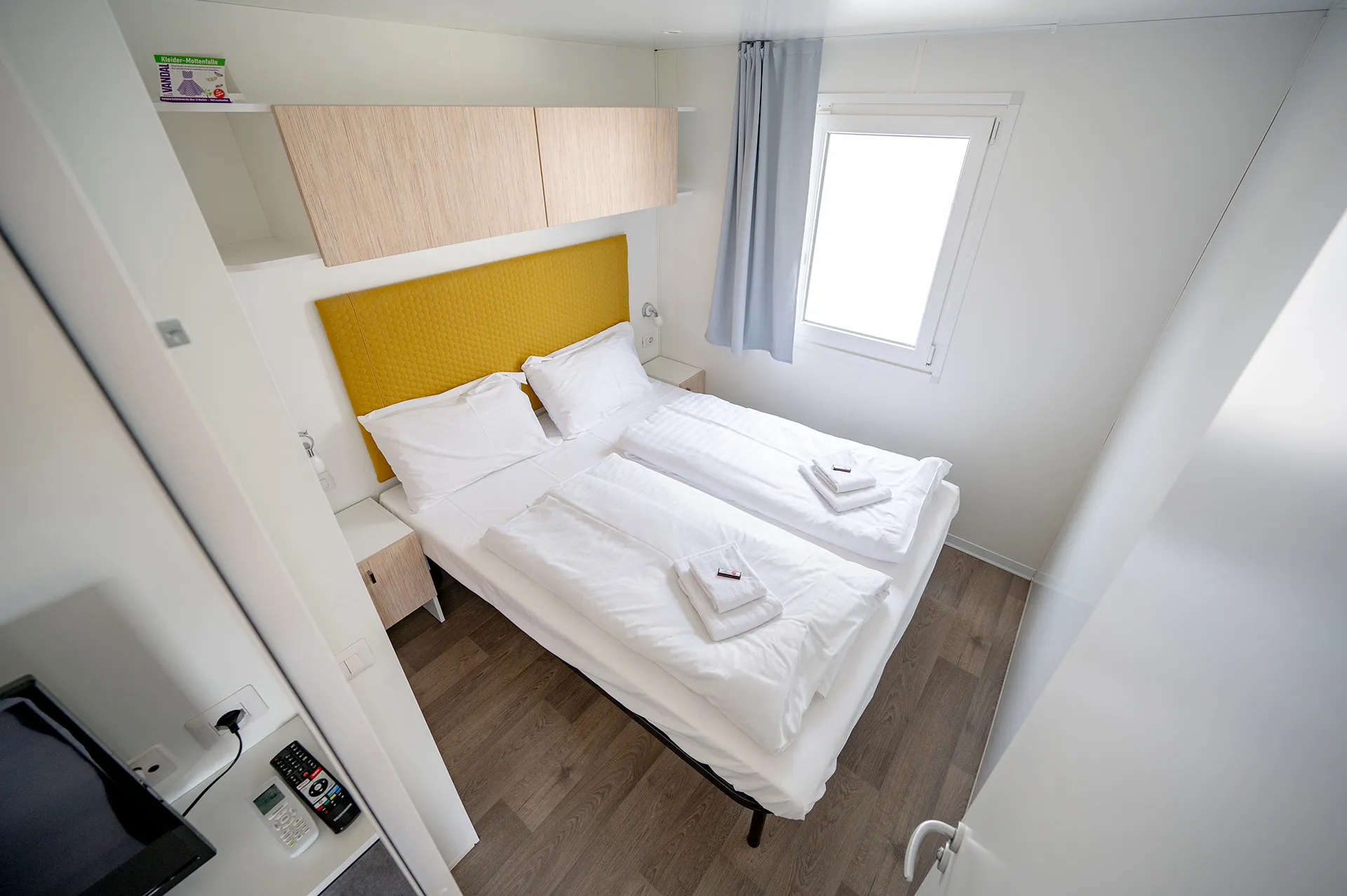 Großes Doppelbett im Mobilheim Premium I am Camping Resort Riegersburg.