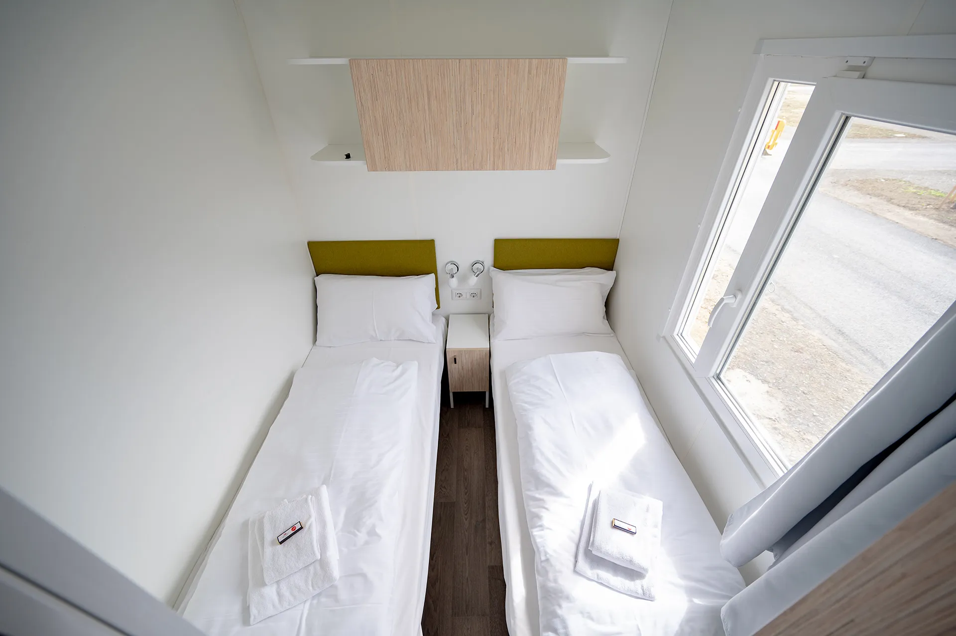 Einzelbetten im Mobilheim Premium I am Camping Resort Riegersburg.